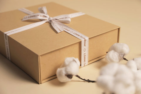 Gift wrapping Lūmmi in Colour™ Babywear
