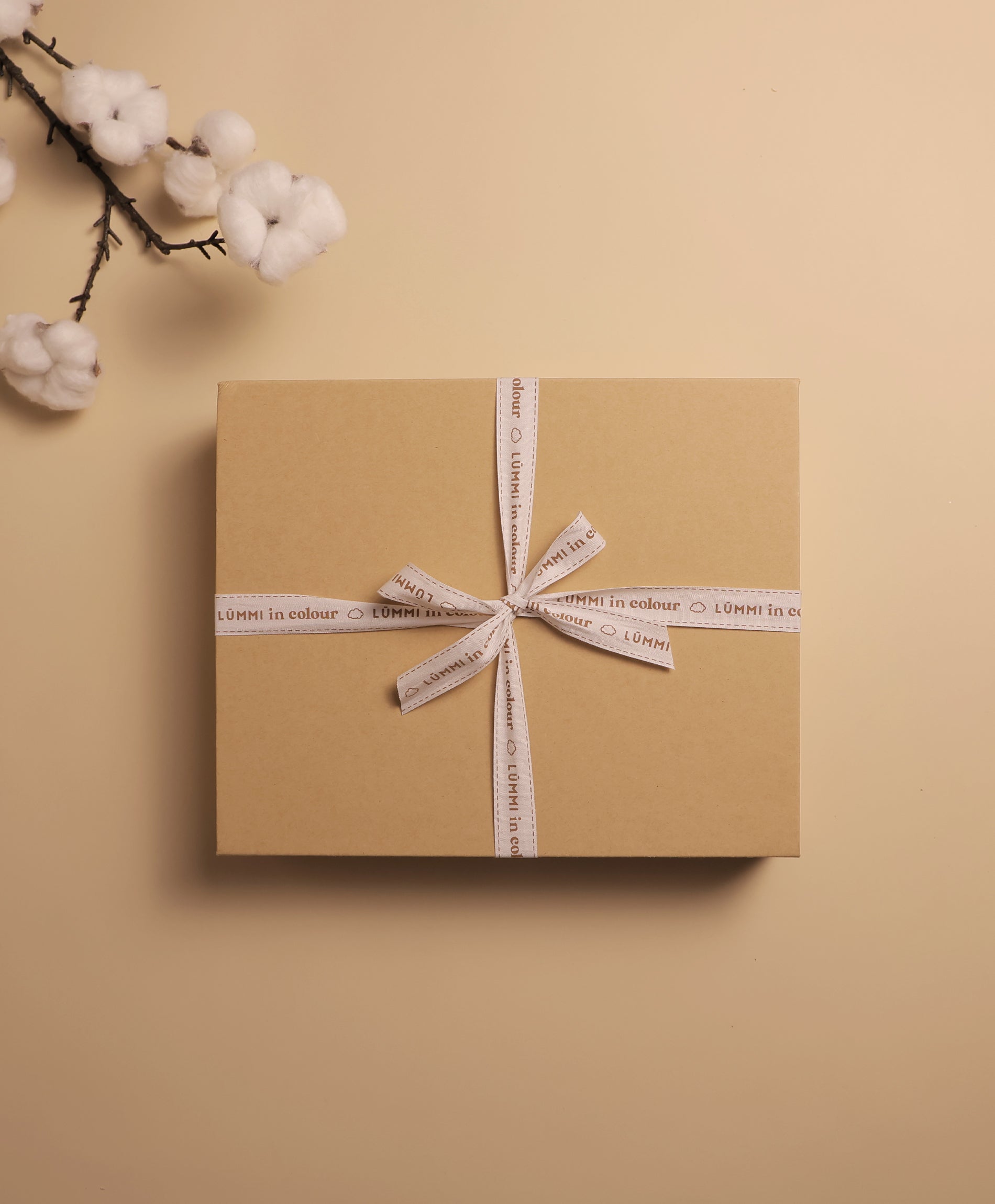 Gift wrapping Lūmmi in Colour™ Babywear