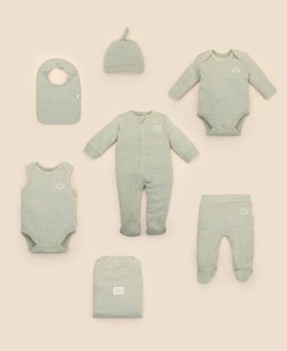 Sage green baby essentials set — bodysuit, growsuit, beanie, bib and pants for the first year