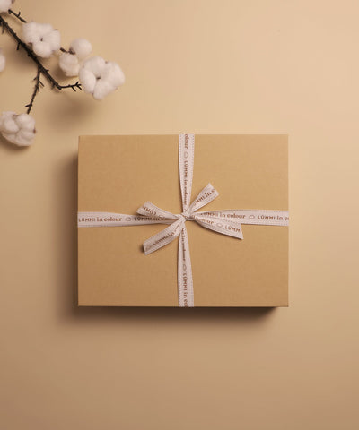 Gift wrapping Lūmmi in Colour™ Babywear
