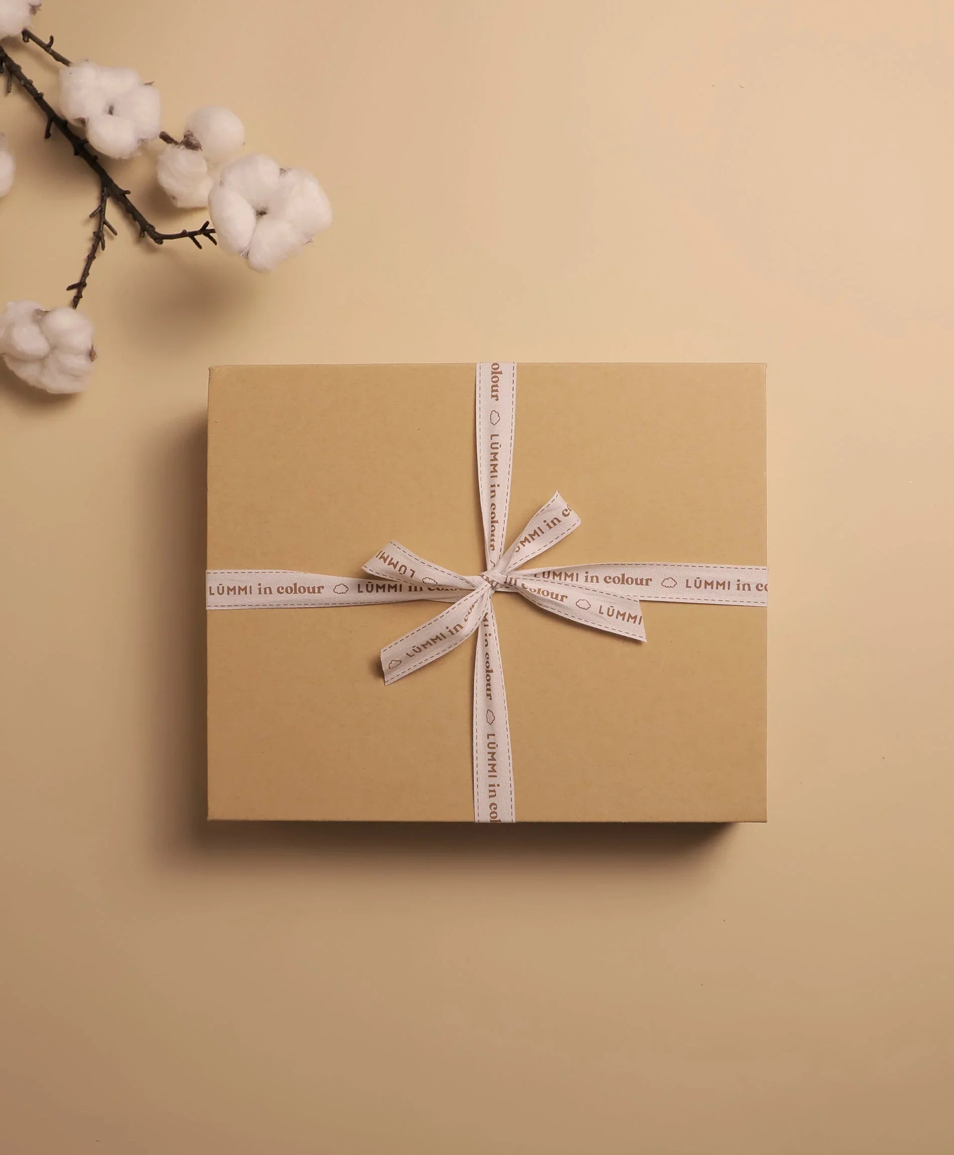 Gift wrapping Lūmmi in Colour™ Babywear