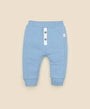 Organic Cotton Button Pants - Sky Blue baby pants in sky blue with button placket and ribbed cuffs for parents seeking soft organic babywear.